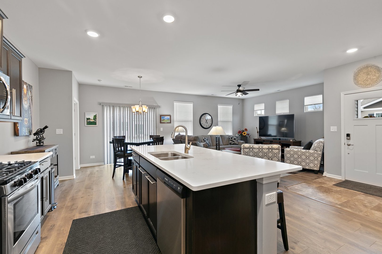 1979 Southern Circle, Unit 1979 Pingree Grove, IL 60140 - Photo 8 of 22 a large kitchen with a table and chairs