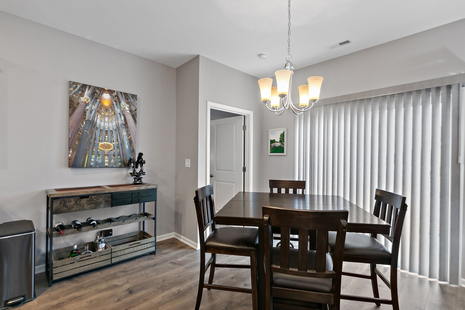 1979 Southern Circle, Unit 1979 Pingree Grove, IL 60140 - Photo 10 of 22 a view of a dining room with furniture and chandelier