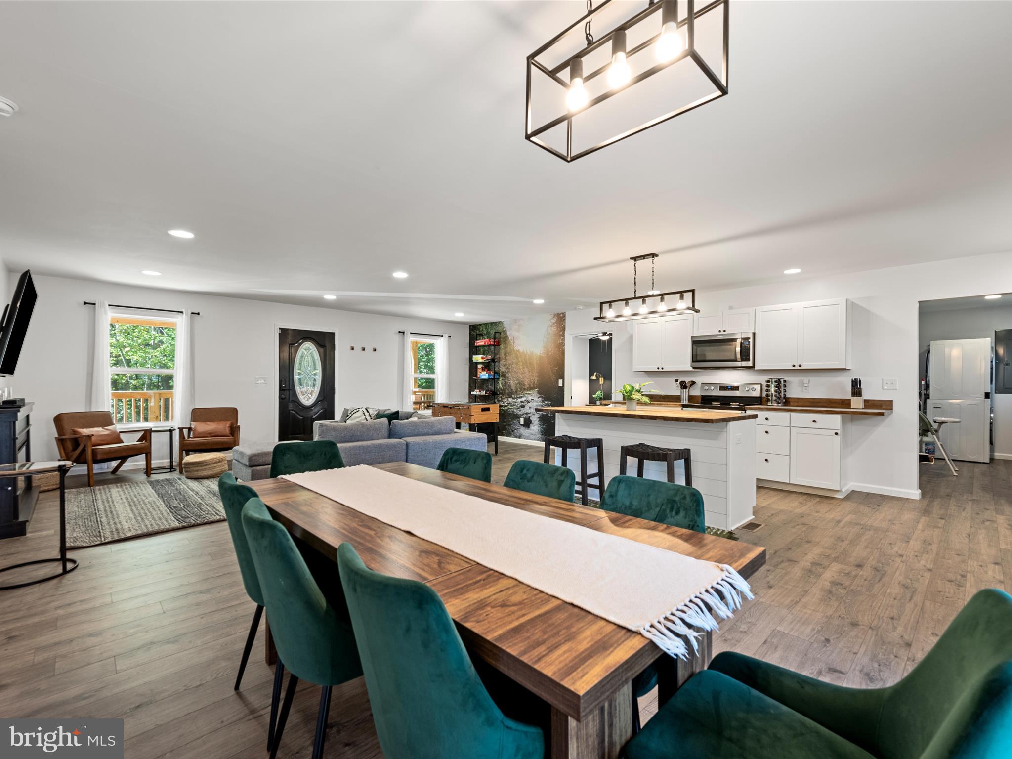 8650 Supinlick Ridge Road Mount Jackson, VA 22842 - Photo 11 of 62 a view of a dining room with furniture