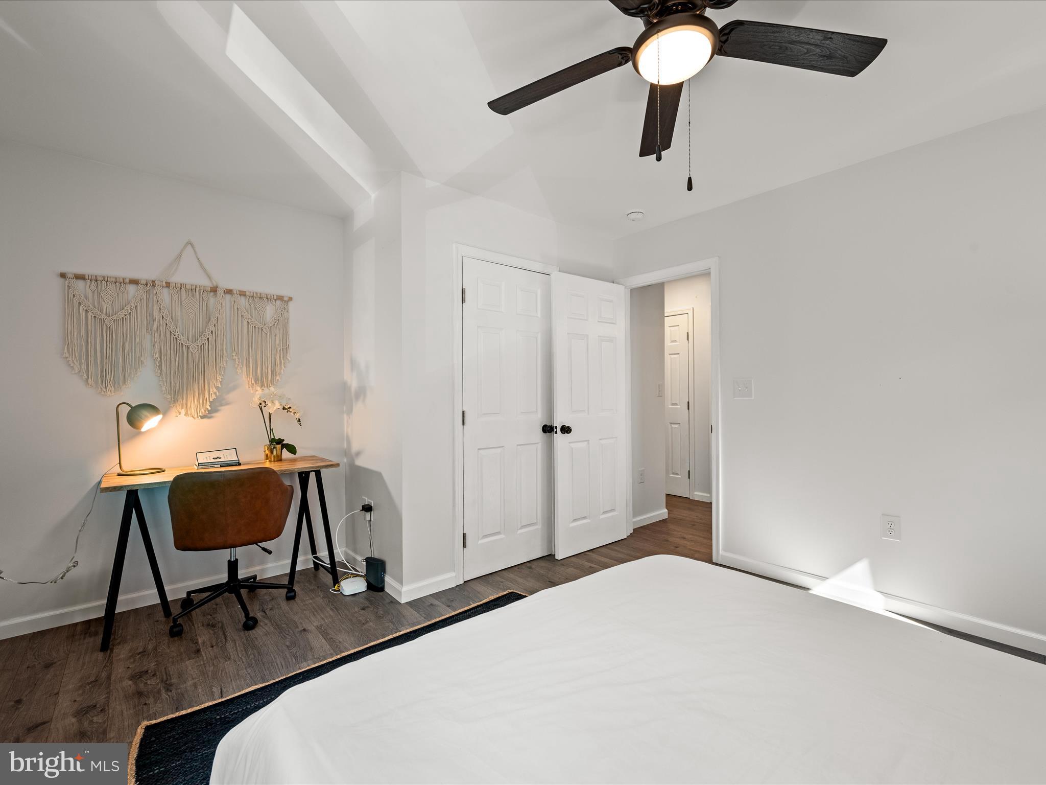8650 Supinlick Ridge Road Mount Jackson, VA 22842 - Photo 28 of 62 a bedroom with a bed a desk and chair