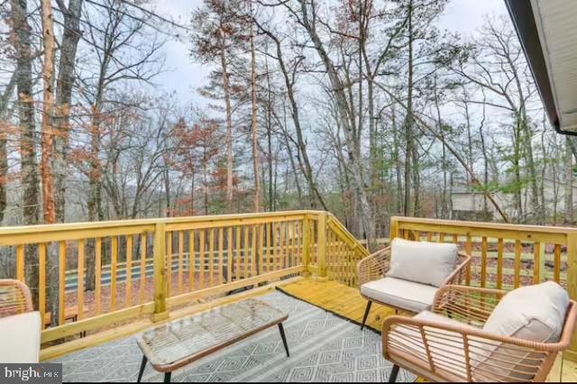 8650 Supinlick Ridge Road Mount Jackson, VA 22842 - Photo 32 of 62 a view of a chair and table on the deck