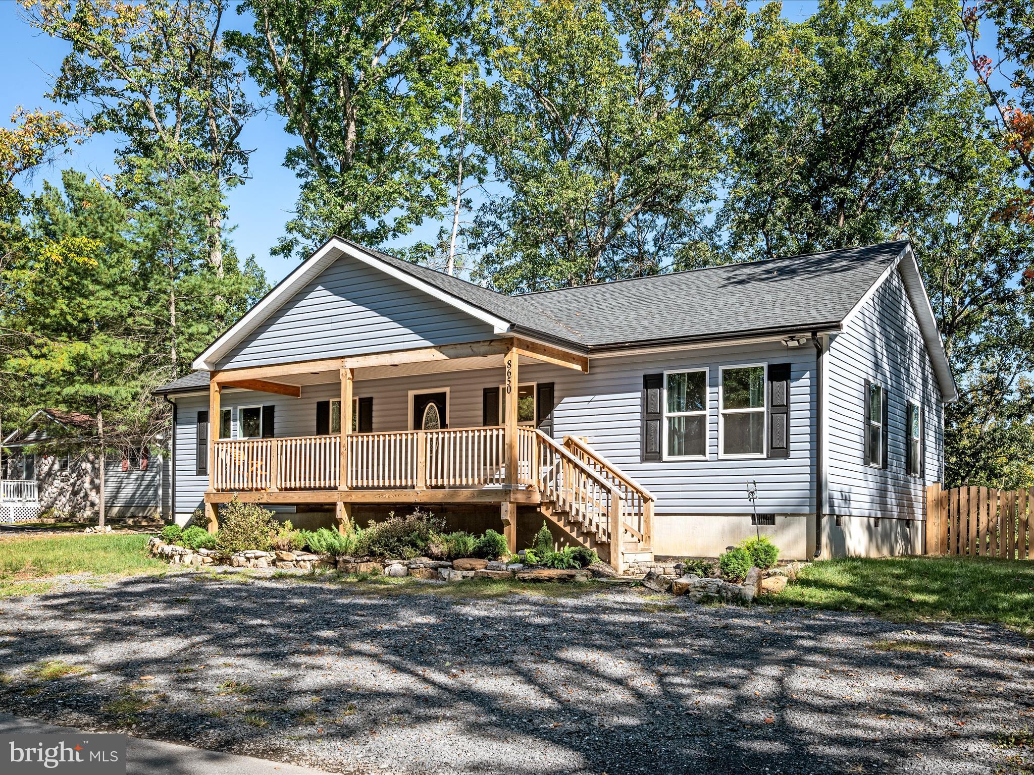 8650 Supinlick Ridge Road Mount Jackson, VA 22842 - Photo 37 of 62 a front view of a house with a yard