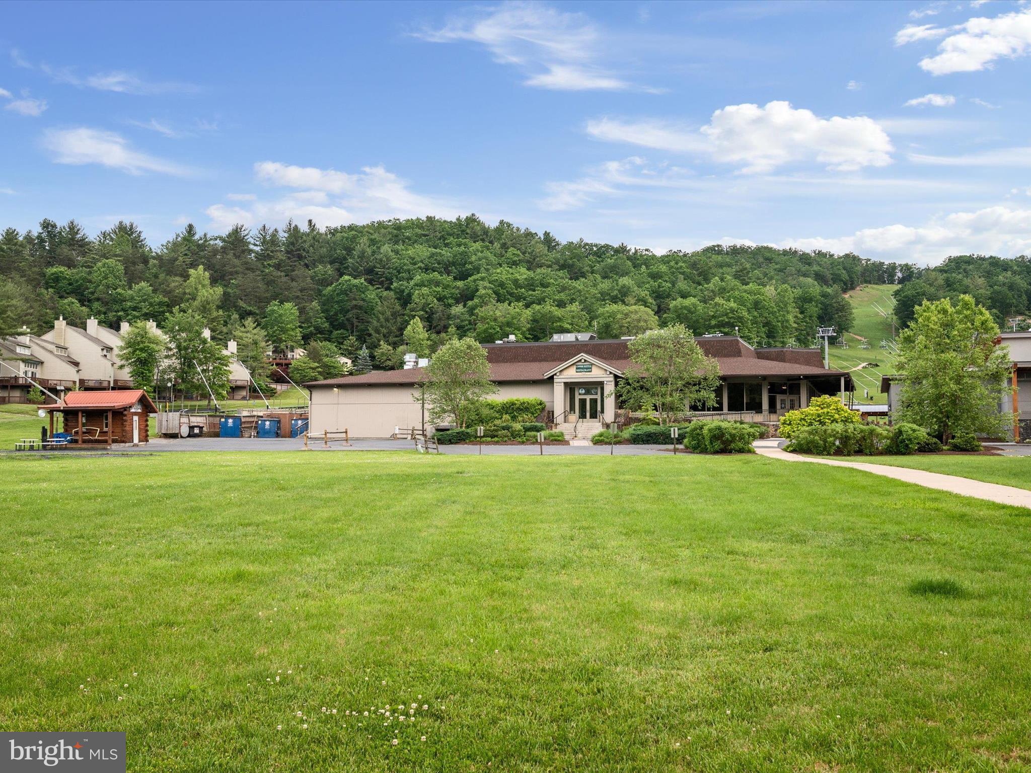 8650 Supinlick Ridge Road Mount Jackson, VA 22842 - Photo 47 of 62 a front view of a house with a garden