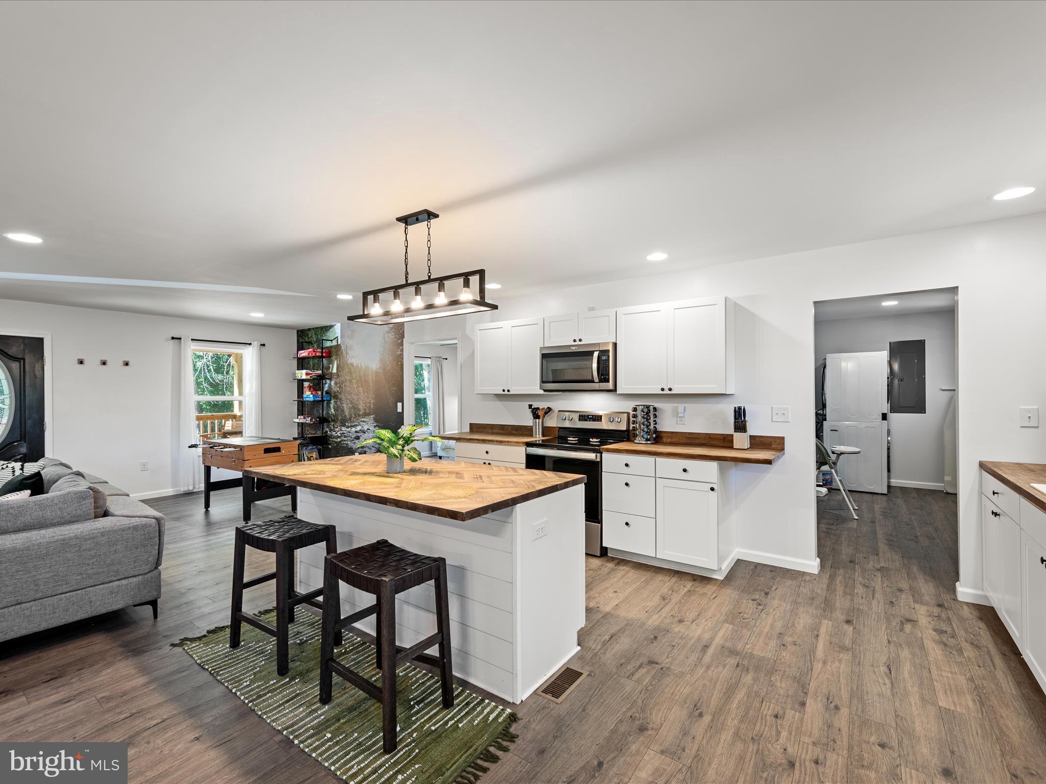 8650 Supinlick Ridge Road Mount Jackson, VA 22842 - Photo 6 of 62 a kitchen with a sink a counter top space and stainless steel appliances