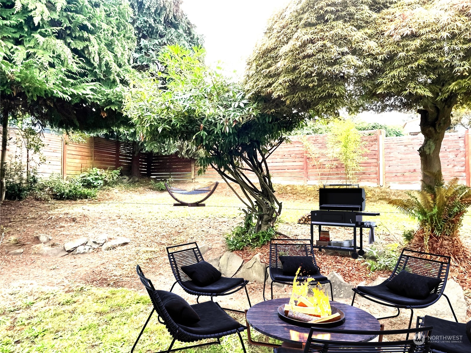 7513 South Sunnycrest Road Seattle, WA 98178 - Photo 15 of 16 a swimming pool with outdoor seating and yard