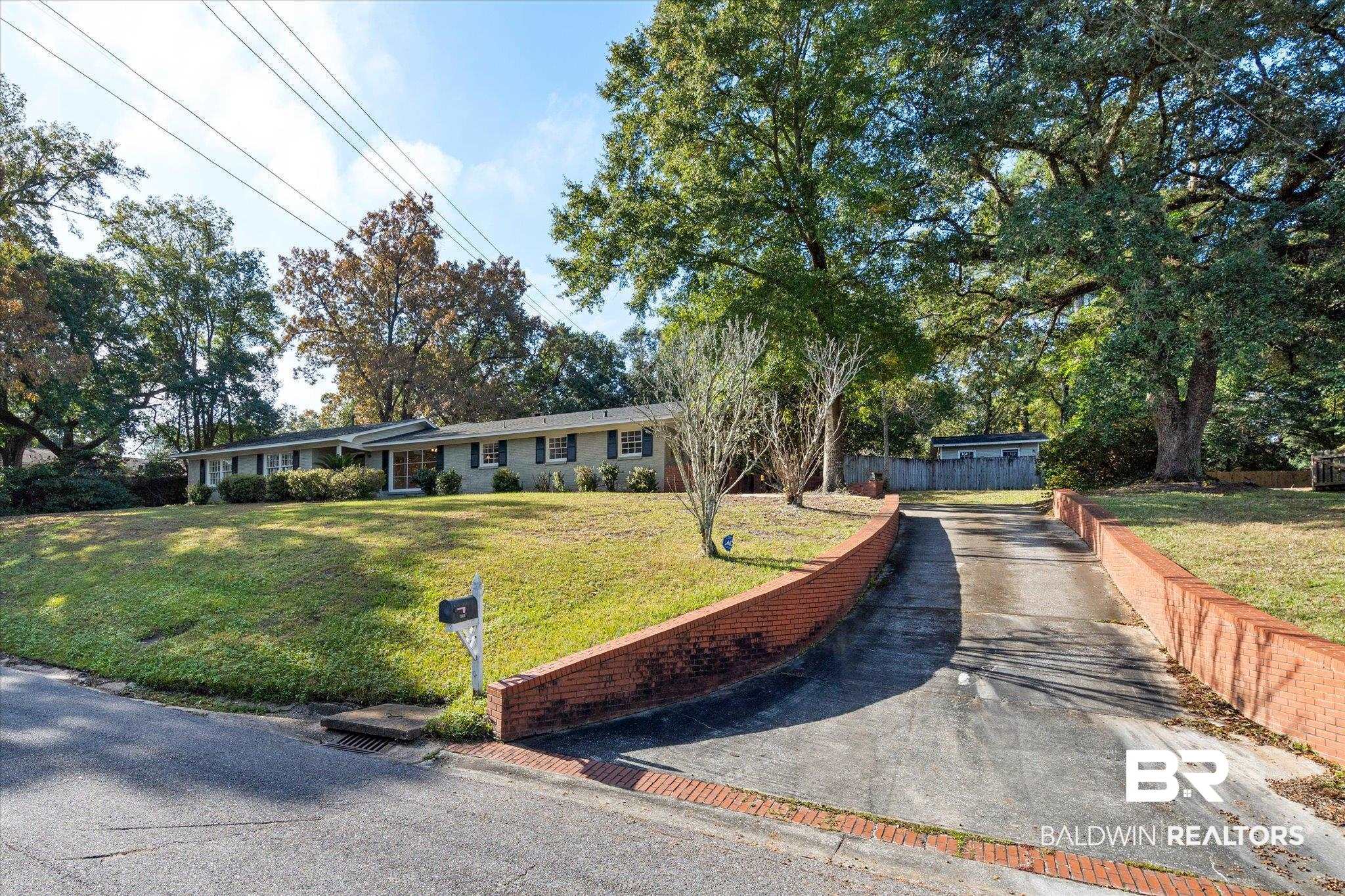 3807 Hillcrest Lane Mobile, AL 36693 - Photo 2 of 28 Driveway Leading to Carport
