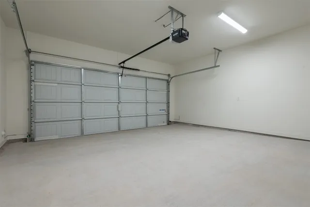 a view of storage and utility room with washer and dryer