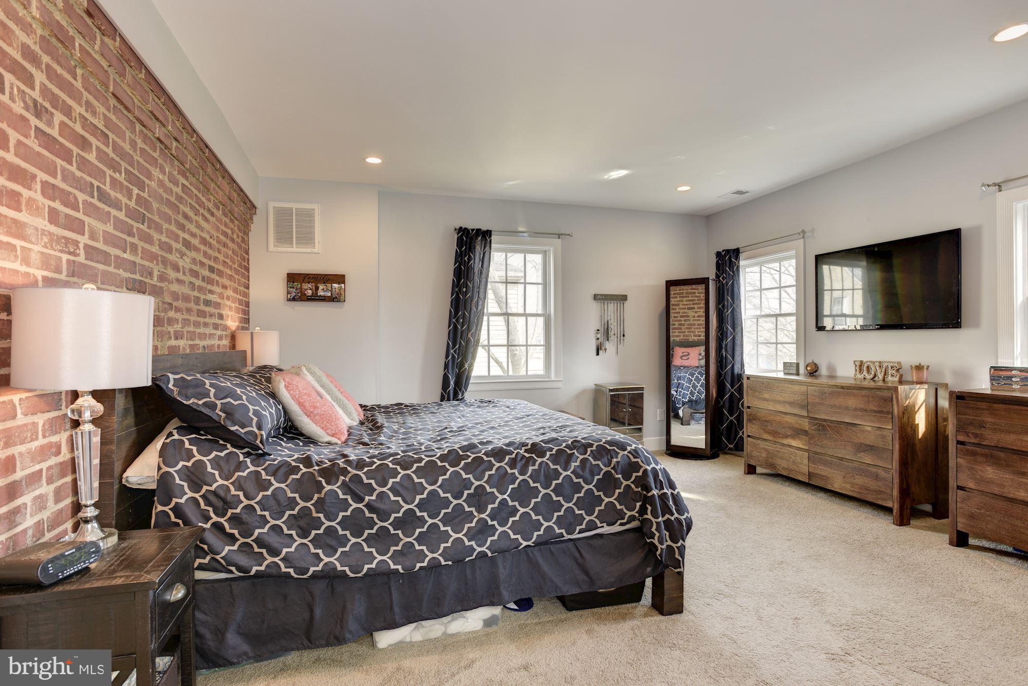 803 Kingston Road Baltimore, MD 21212 - Photo 20 of 51 Exposed brick in master bedroom
