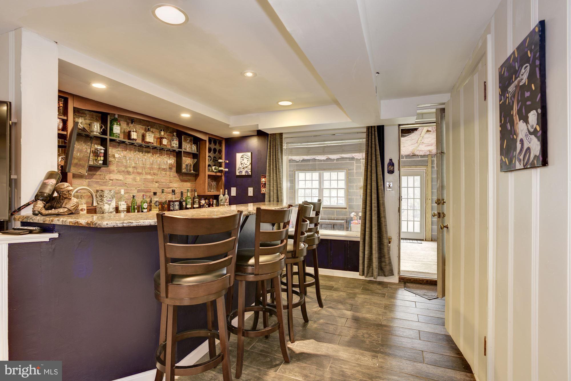 803 Kingston Road Baltimore, MD 21212 - Photo 37 of 51 Custom built bar with granite.