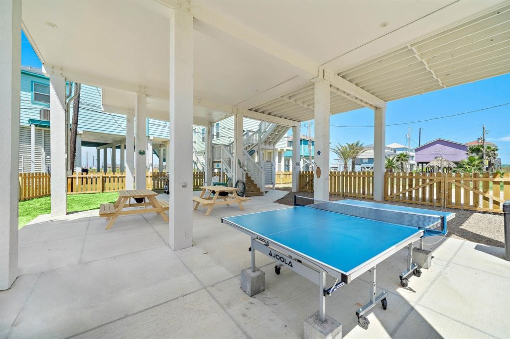 622 Crane Court Surfside Beach, TX 77541 - Photo 11 of 30 wooden floor with pool table and chairs