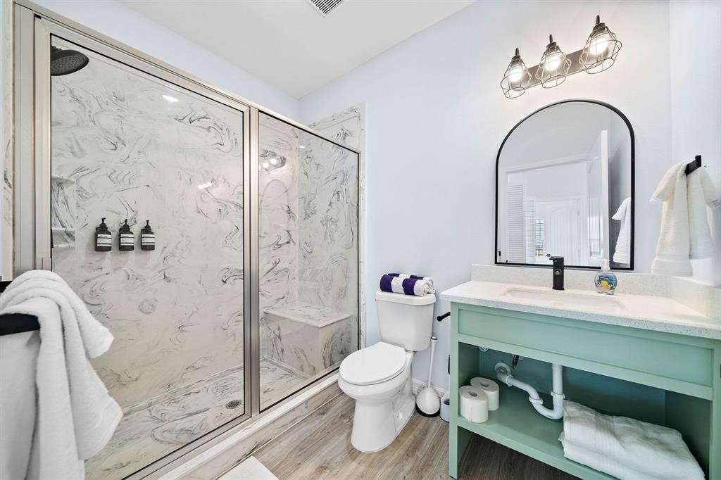 622 Crane Court Surfside Beach, TX 77541 - Photo 28 of 30 a bathroom with a sink toilet and shower