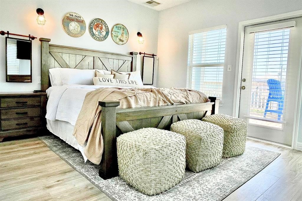 622 Crane Court Surfside Beach, TX 77541 - Photo 4 of 30 a bed sitting in a bedroom next to a window