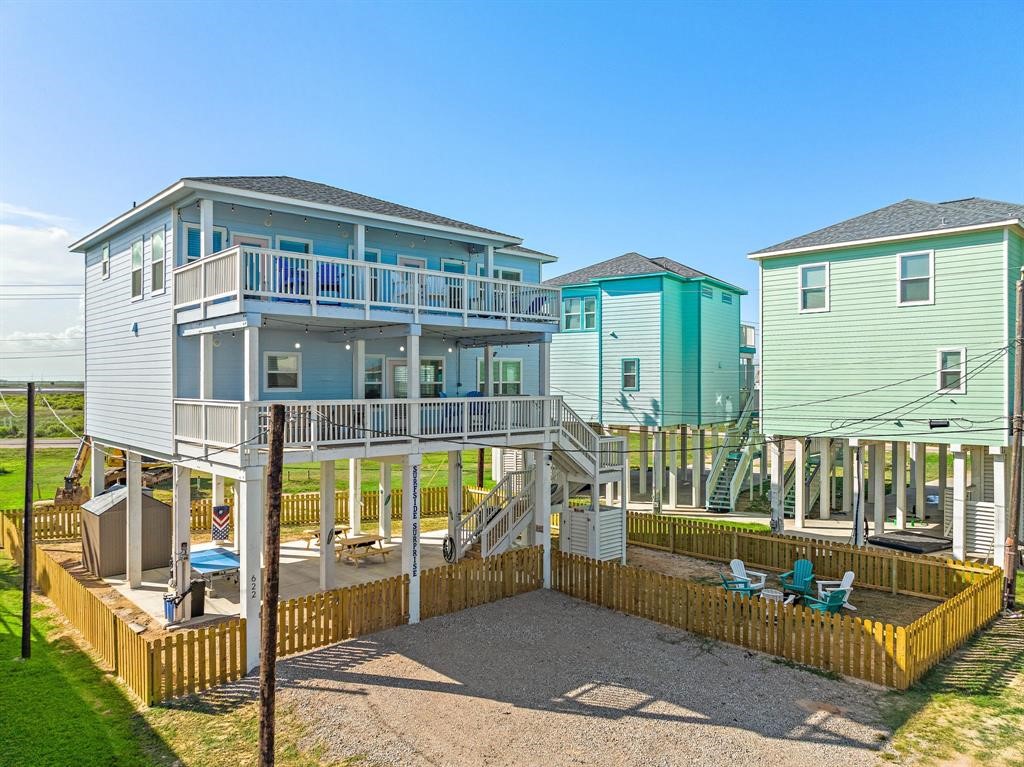 622 Crane Court Surfside Beach, TX 77541 - Photo 9 of 30 a view of a house with couches in the patio