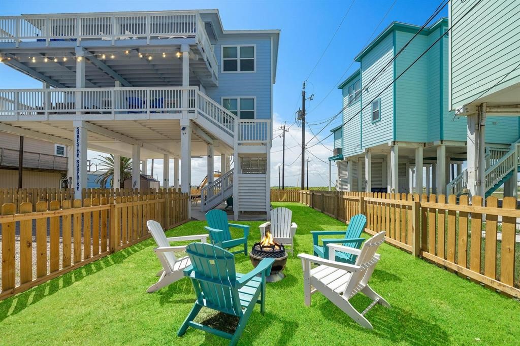 622 Crane Court Surfside Beach, TX 77541 - Photo 10 of 30 a view of a chair and table in backyard of the house