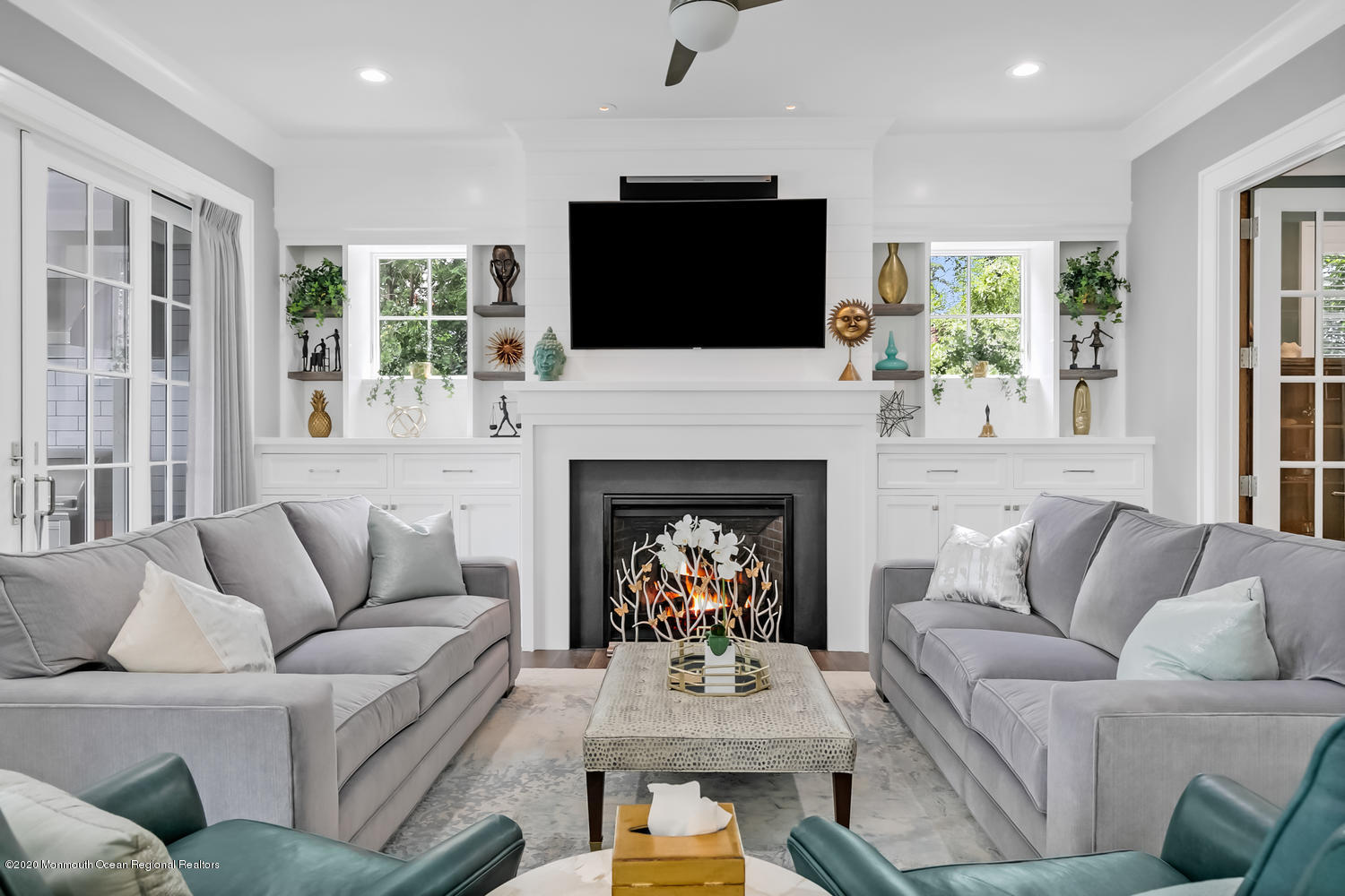 1008 Forrest Road Brielle, NJ 08730 - Photo 11 of 81 a living room with furniture fireplace and flat screen tv
