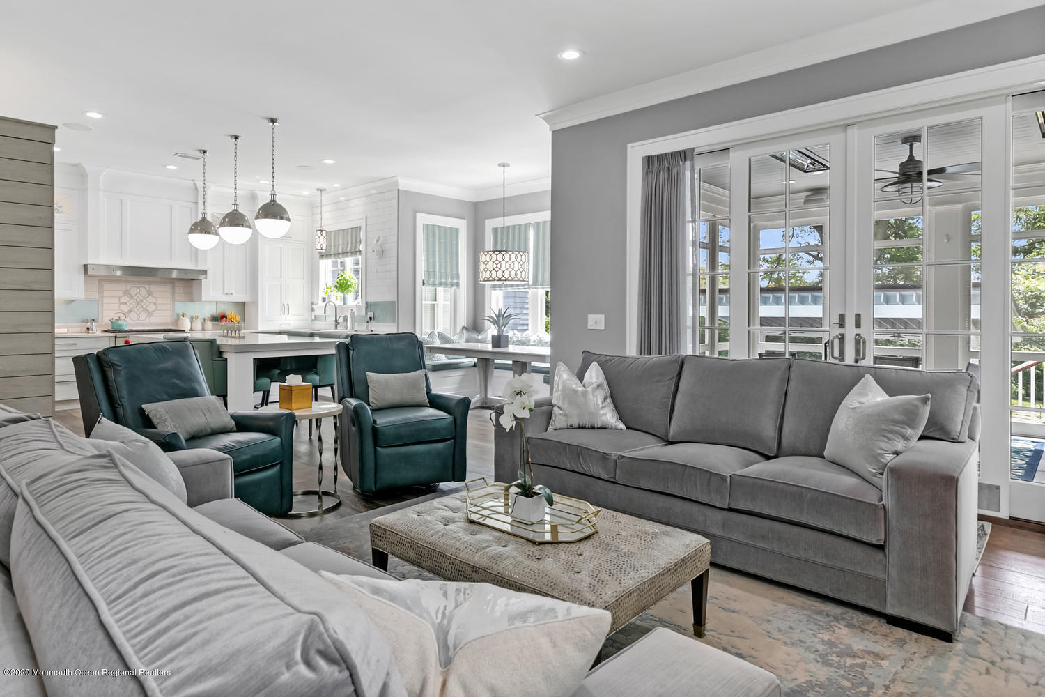 1008 Forrest Road Brielle, NJ 08730 - Photo 13 of 81 a living room with furniture a large window and a chandelier