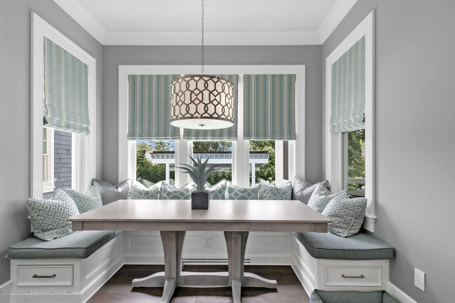 1008 Forrest Road Brielle, NJ 08730 - Photo 14 of 81 a dining room with furniture a chandelier and wooden floor