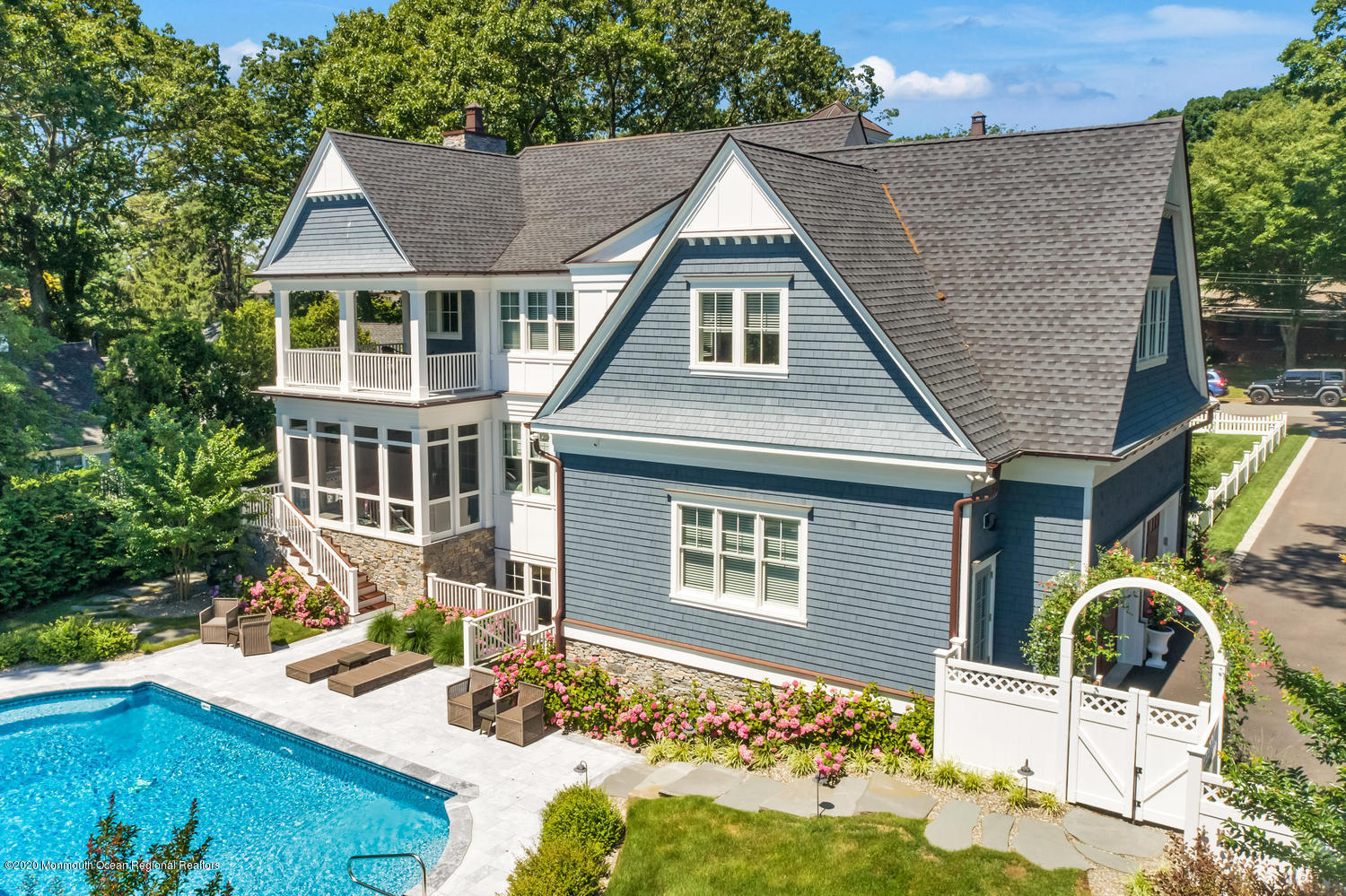 1008 Forrest Road Brielle, NJ 08730 - Photo 47 of 81 a aerial view of a house with swimming pool