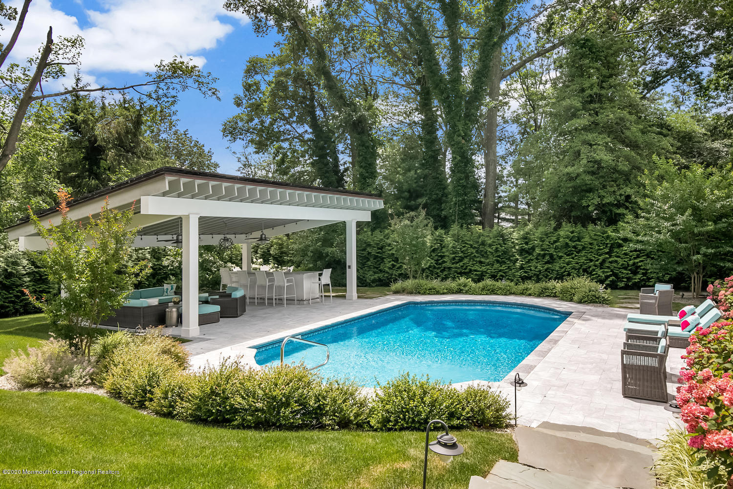 1008 Forrest Road Brielle, NJ 08730 - Photo 52 of 81 a view of a swimming pool with a patio