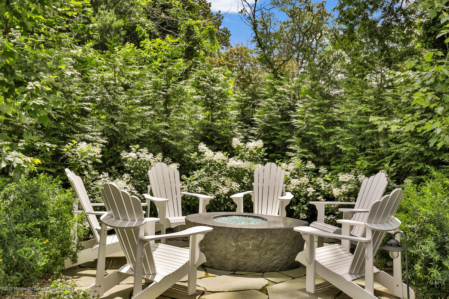 1008 Forrest Road Brielle, NJ 08730 - Photo 60 of 81 a view of backyard of house with seating space