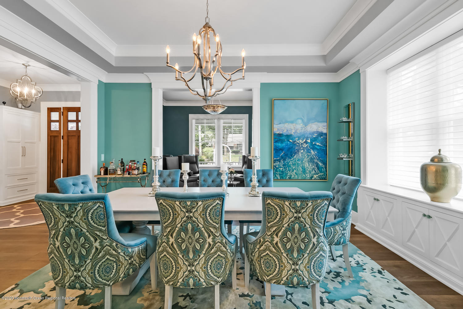 1008 Forrest Road Brielle, NJ 08730 - Photo 7 of 81 a view of a dining room with furniture a chandelier and wooden floor