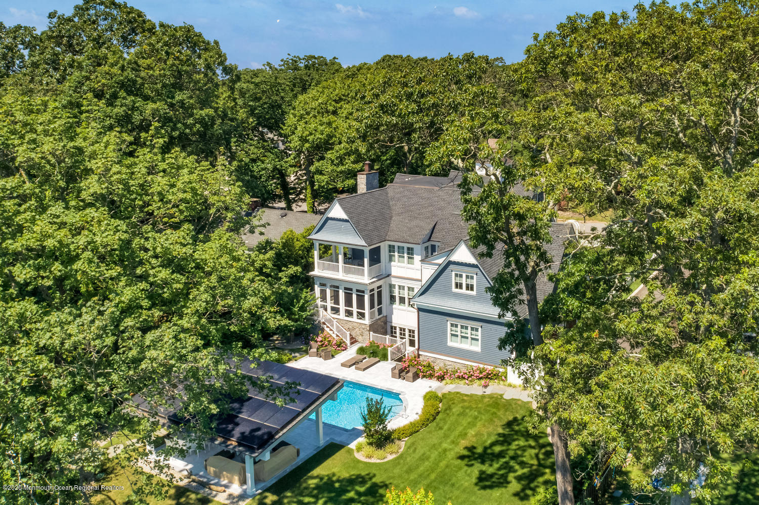 1008 Forrest Road Brielle, NJ 08730 - Photo 64 of 81 an aerial view of a house with yard swimming pool and outdoor seating