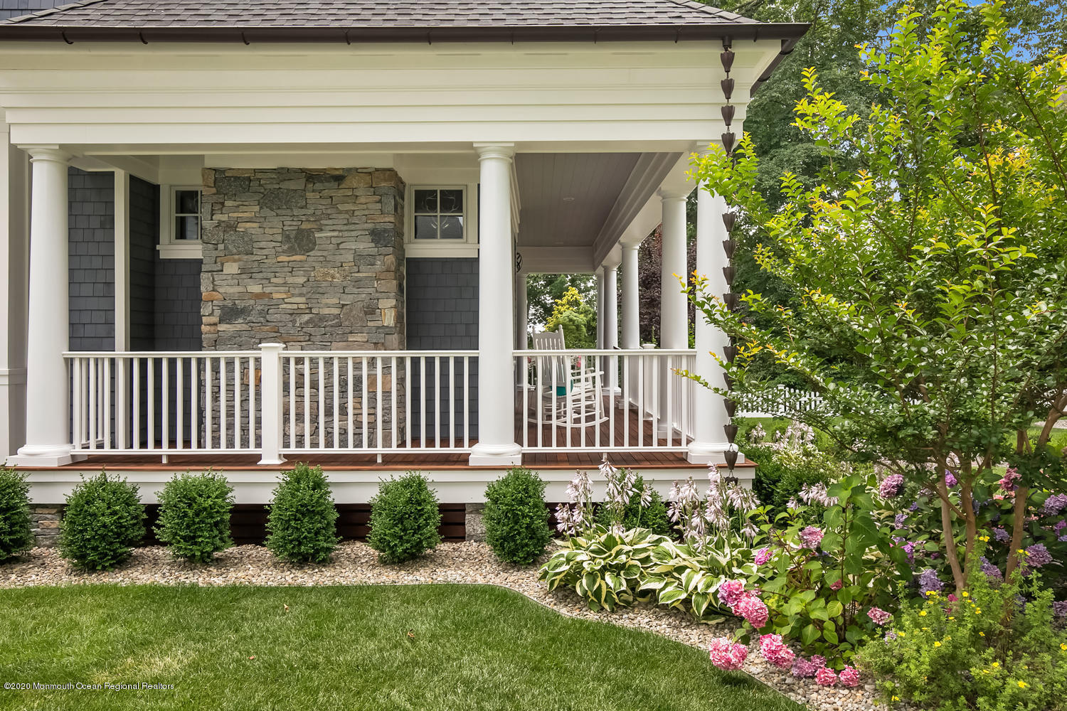 1008 Forrest Road Brielle, NJ 08730 - Photo 67 of 81 a view of a house with a small yard and flower plants