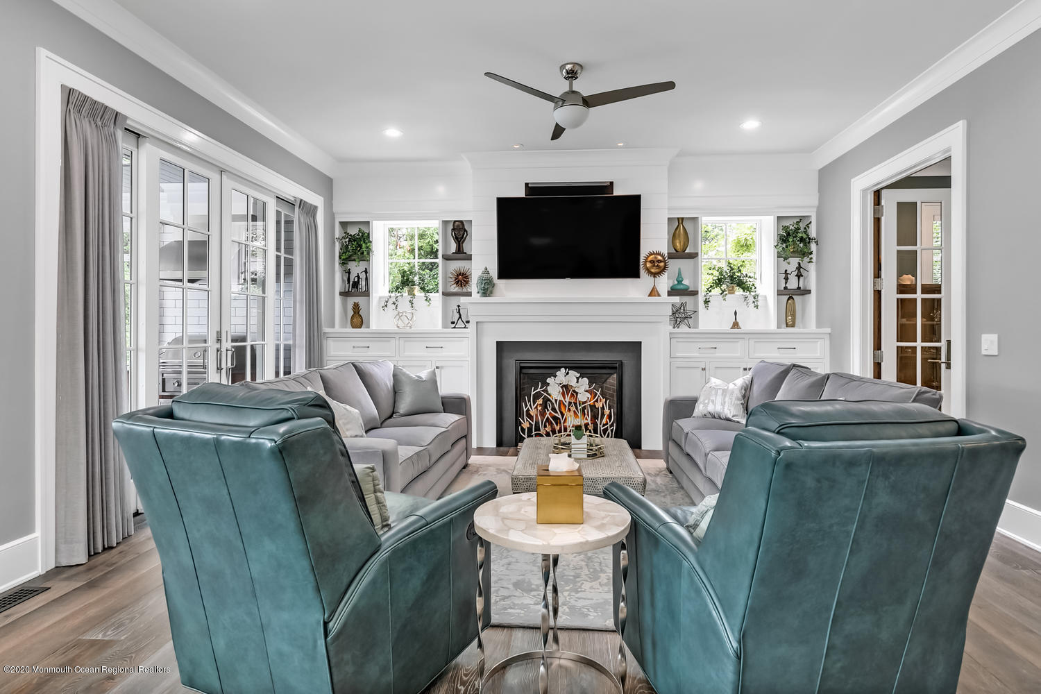 1008 Forrest Road Brielle, NJ 08730 - Photo 10 of 81 a living room with furniture fireplace and a flat screen tv