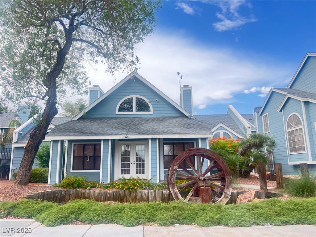 3220 Tocata Drive Las Vegas, NV 89146 - Photo 3 of 12 View of front of property with a chimney, french d