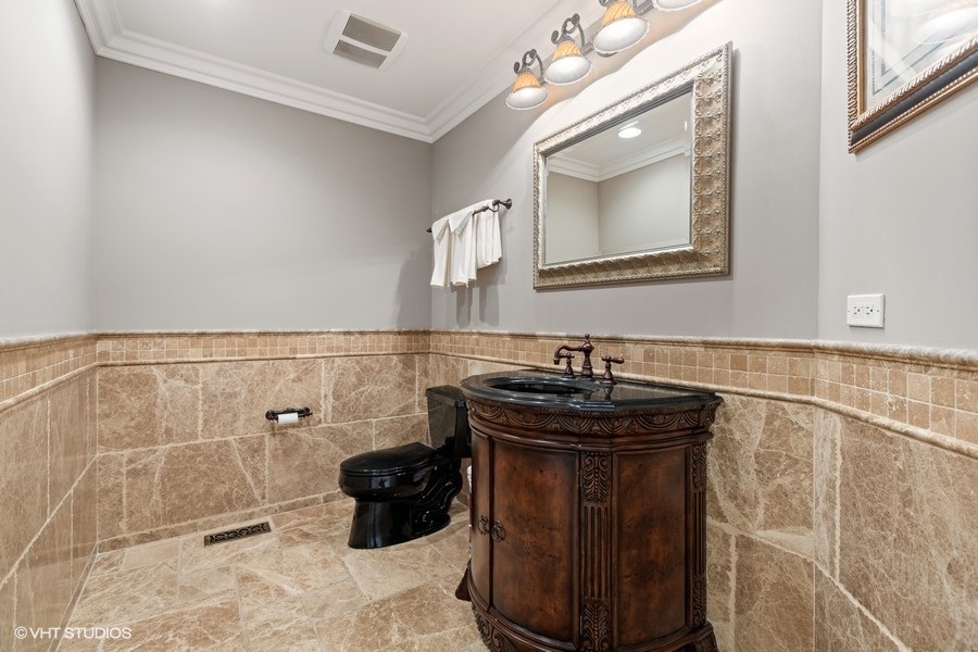 5N695 Dunham Trails Road Wayne, IL 60184 - Photo 8 of 48 a bathroom with a sink a toilet and mirror