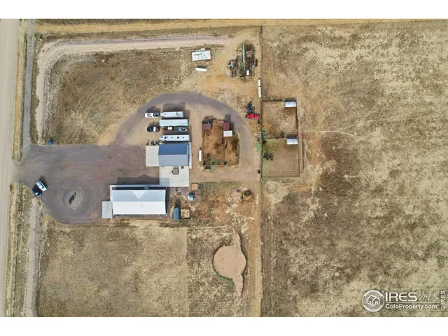 a kitchen with lots of counter top space and stainless steel appliances
