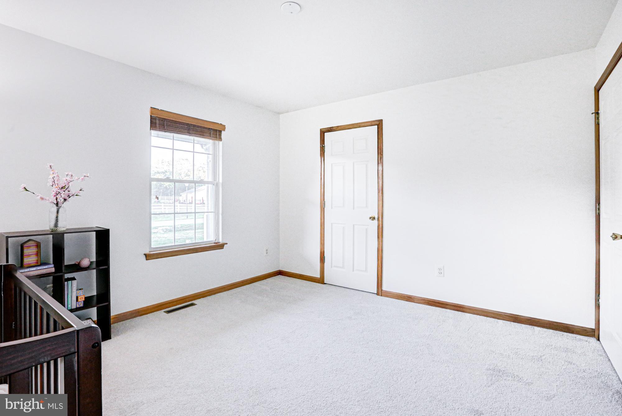 230 Tina Marie Lane Smyrna, DE 19977 - Photo 55 of 83 a view of an empty room with a window