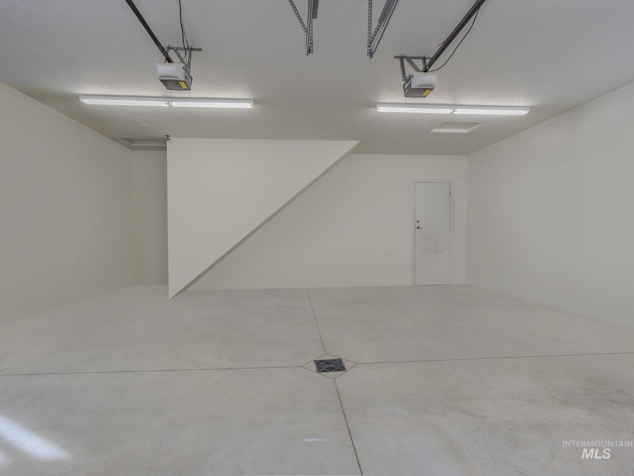 659 Reservation Line Road Cottonwood, ID 83522 - Photo 48 of 50 Garage with a garage door opener