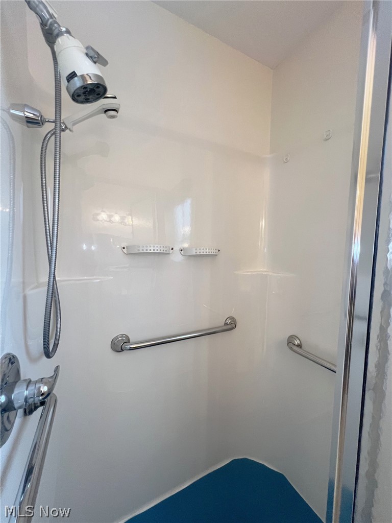 5203 Ridgeland Street Lorain, OH 44055 - Photo 17 of 39 Bathroom with an enclosed shower
