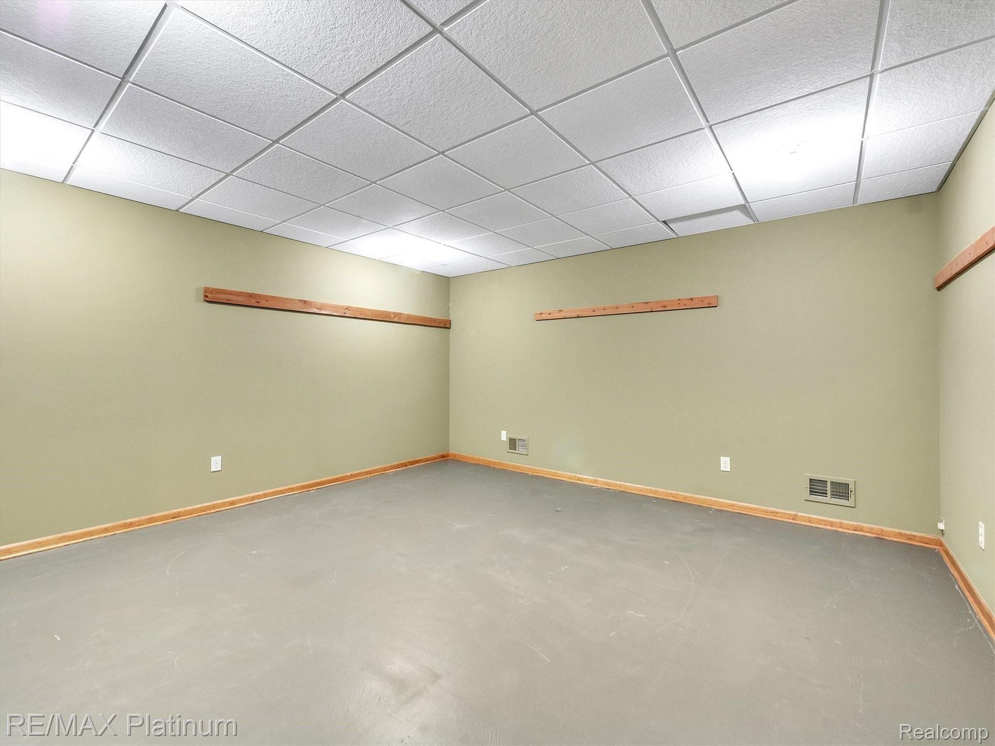 11061 Wiggins Road Howell, MI 48855 - Photo 36 of 79 REC ROOM IS HUGE