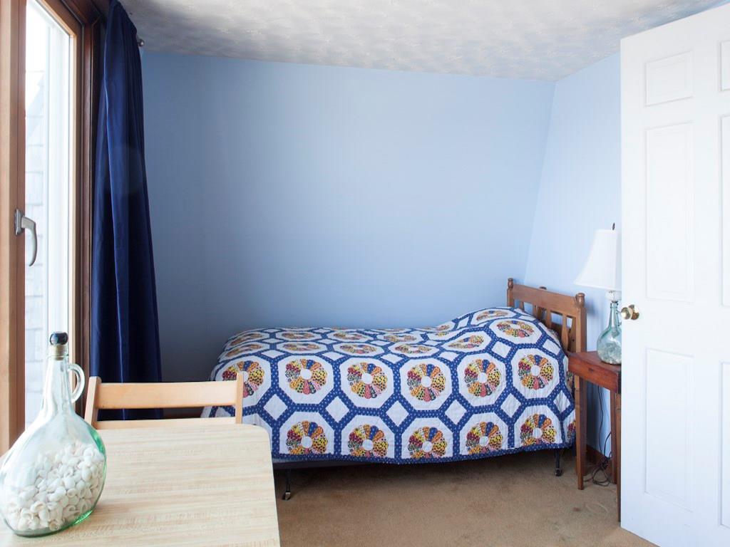 258 Hills Beach Road Biddeford, ME 04005 - Photo 18 of 28 The front bedroom spans across the...