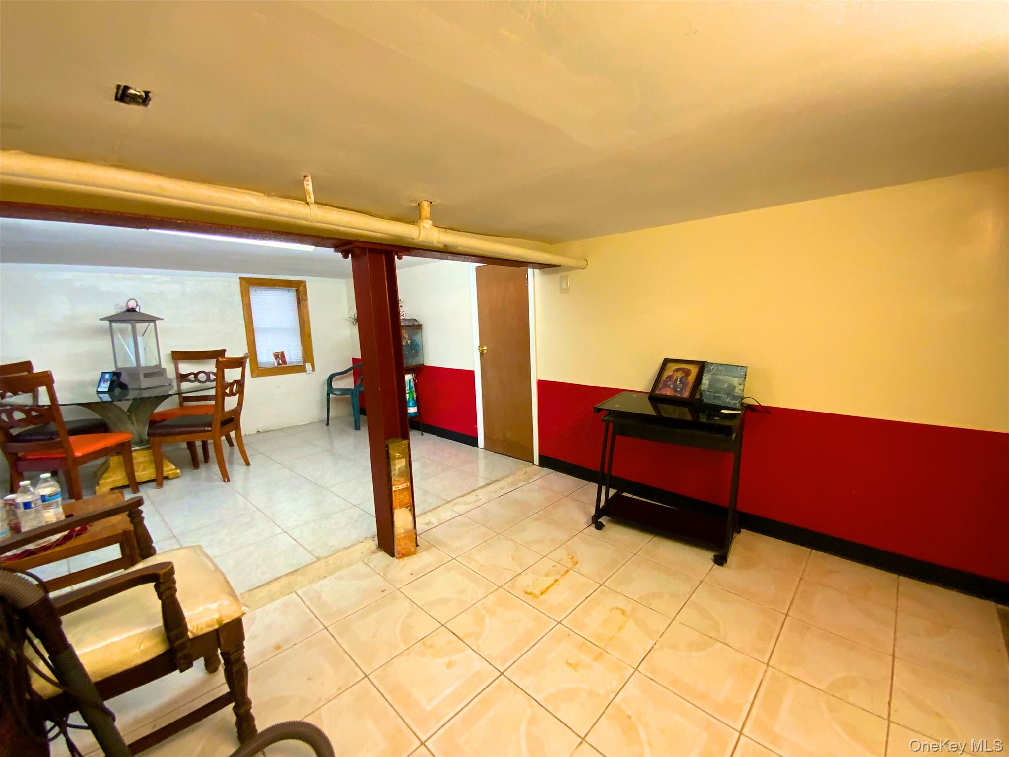 552 Beach 68th Street Queens, NY 11692 - Photo 22 of 34 a living room with furniture