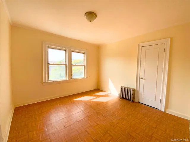 a view of an empty room and window