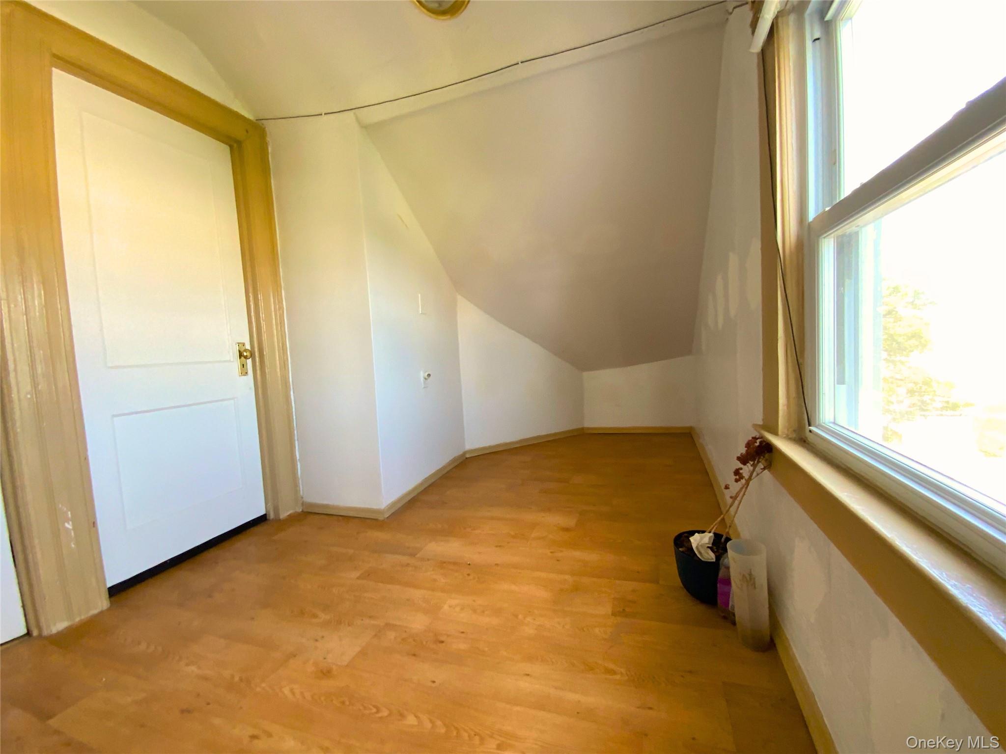 552 Beach 68th Street Queens, NY 11692 - Photo 31 of 34 a view of a room with a window and a bathroom