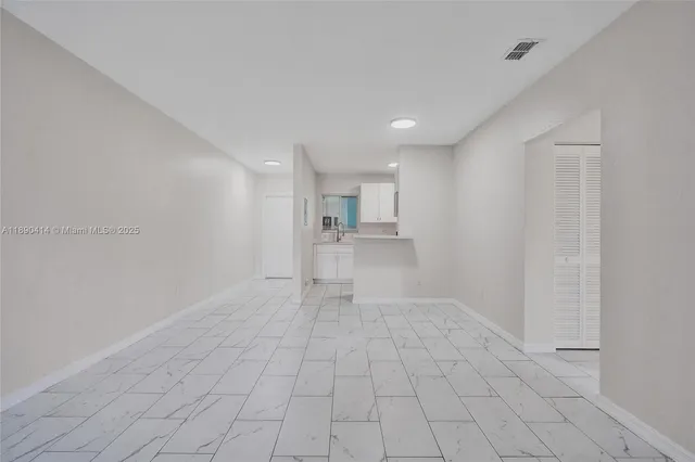 a kitchen with a stove and a microwave