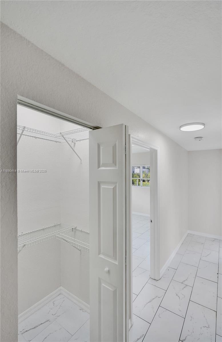 1945 Calais Drive, Unit 9 Miami Beach, FL 33141 - Photo 28 of 47 a view of an empty room