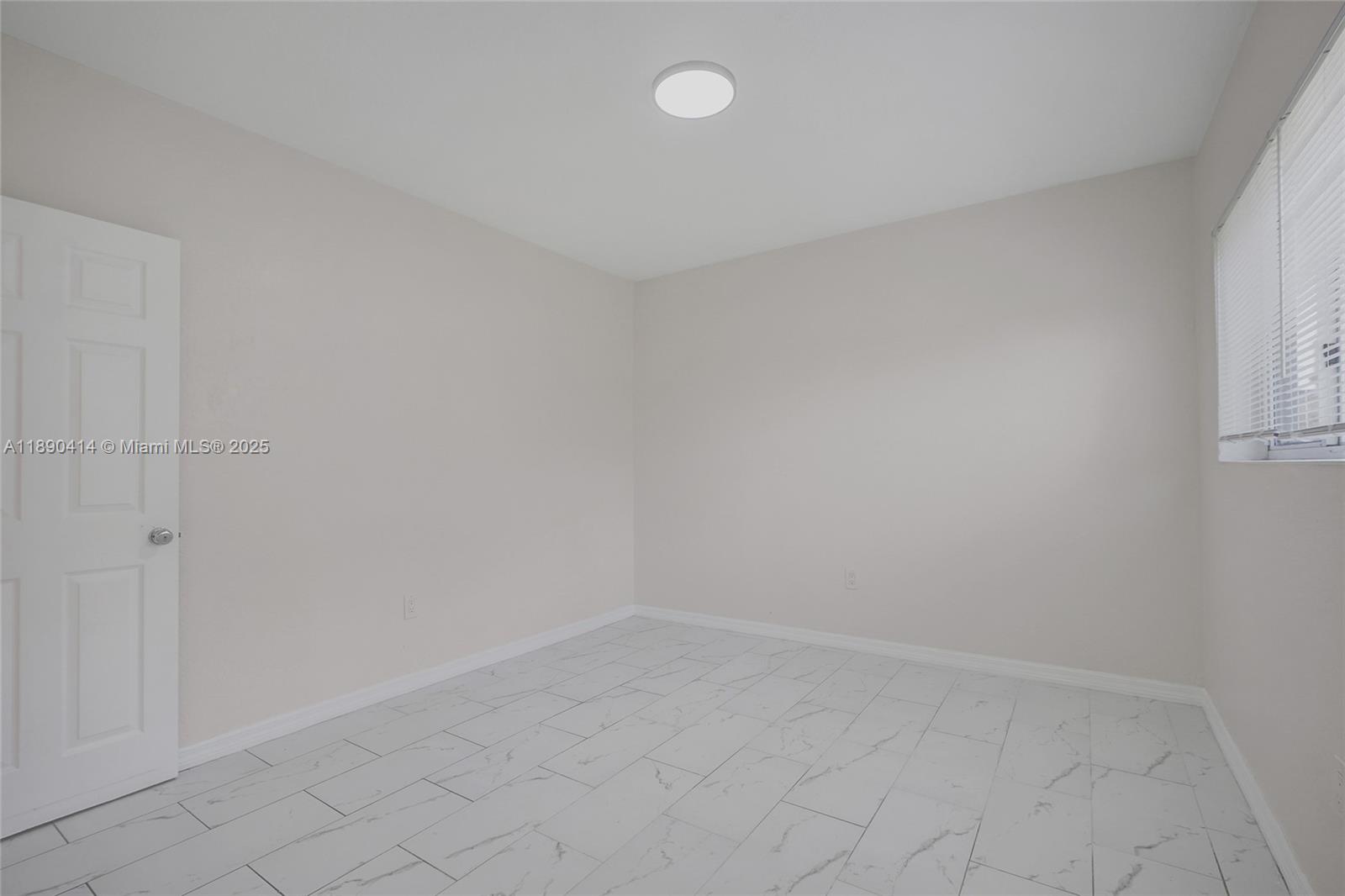1945 Calais Drive, Unit 9 Miami Beach, FL 33141 - Photo 29 of 47 a view of an empty room