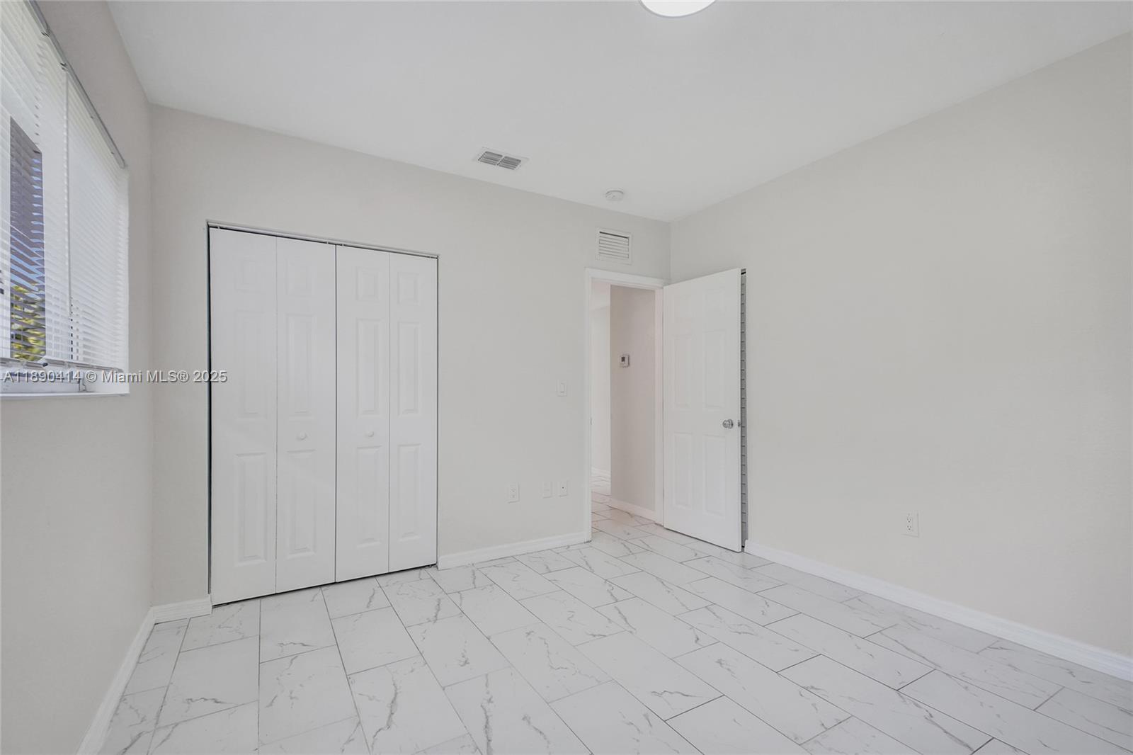 1945 Calais Drive, Unit 9 Miami Beach, FL 33141 - Photo 30 of 47 a view of an empty room