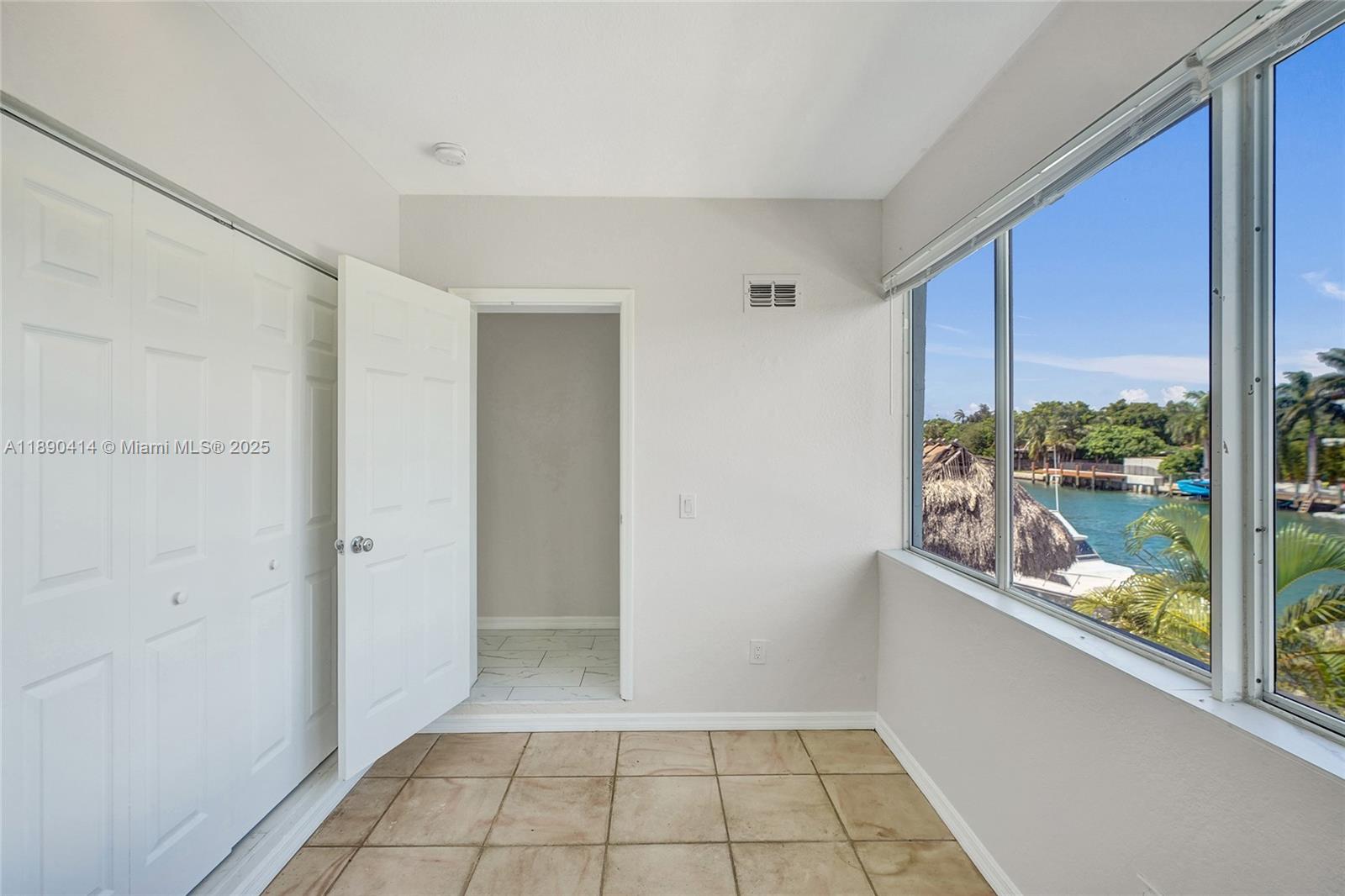 1945 Calais Drive, Unit 9 Miami Beach, FL 33141 - Photo 38 of 47 a view of a room with a large window
