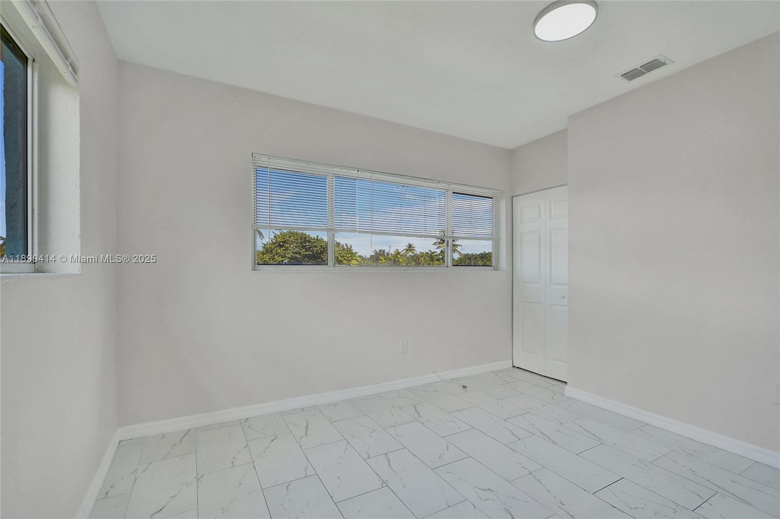 1945 Calais Drive, Unit 9 Miami Beach, FL 33141 - Photo 44 of 47 a view of an empty room