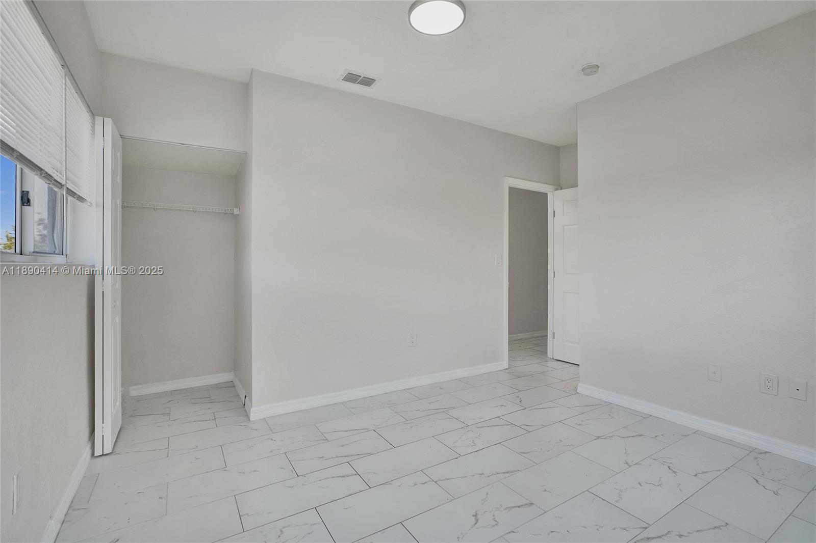 1945 Calais Drive, Unit 9 Miami Beach, FL 33141 - Photo 46 of 47 a view of an empty room