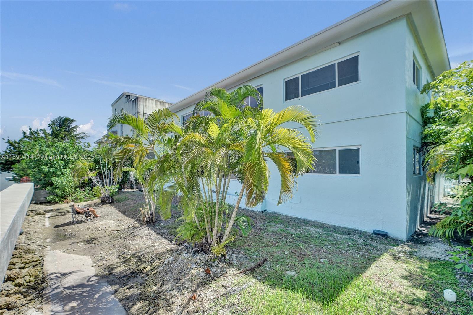 1945 Calais Drive, Unit 9 Miami Beach, FL 33141 - Photo 47 of 47 a view of a house with a yard