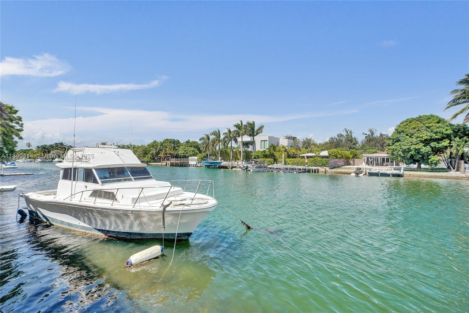 1945 Calais Drive, Unit 9 Miami Beach, FL 33141 - Photo 5 of 47 a view of a lake with a city