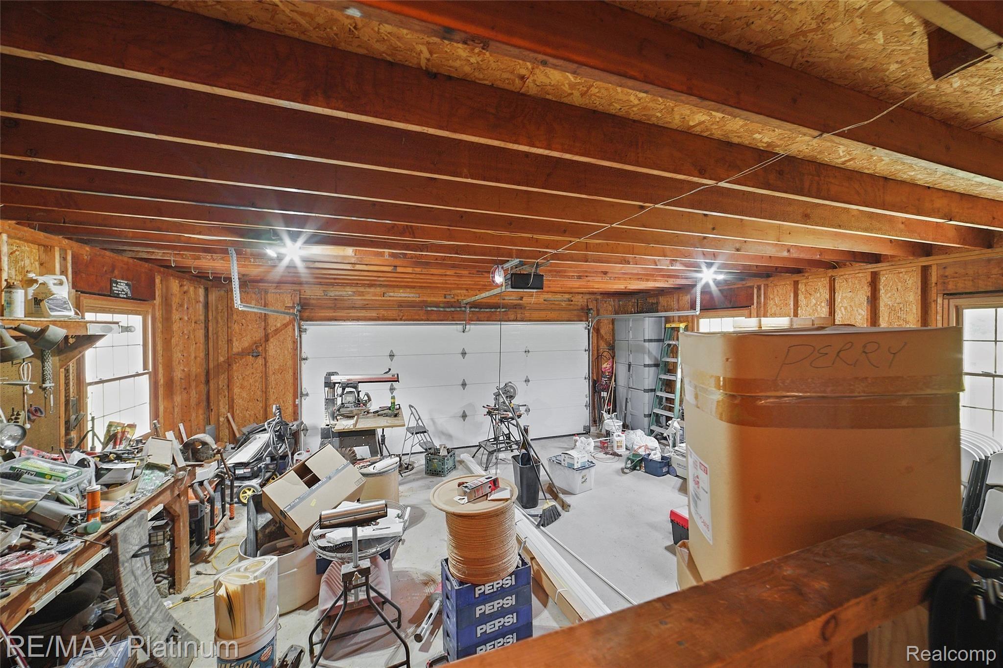 7055 West Allen Road Fowlerville, MI 48836 - Photo 30 of 34 029-photo-garage-9469714.jpg