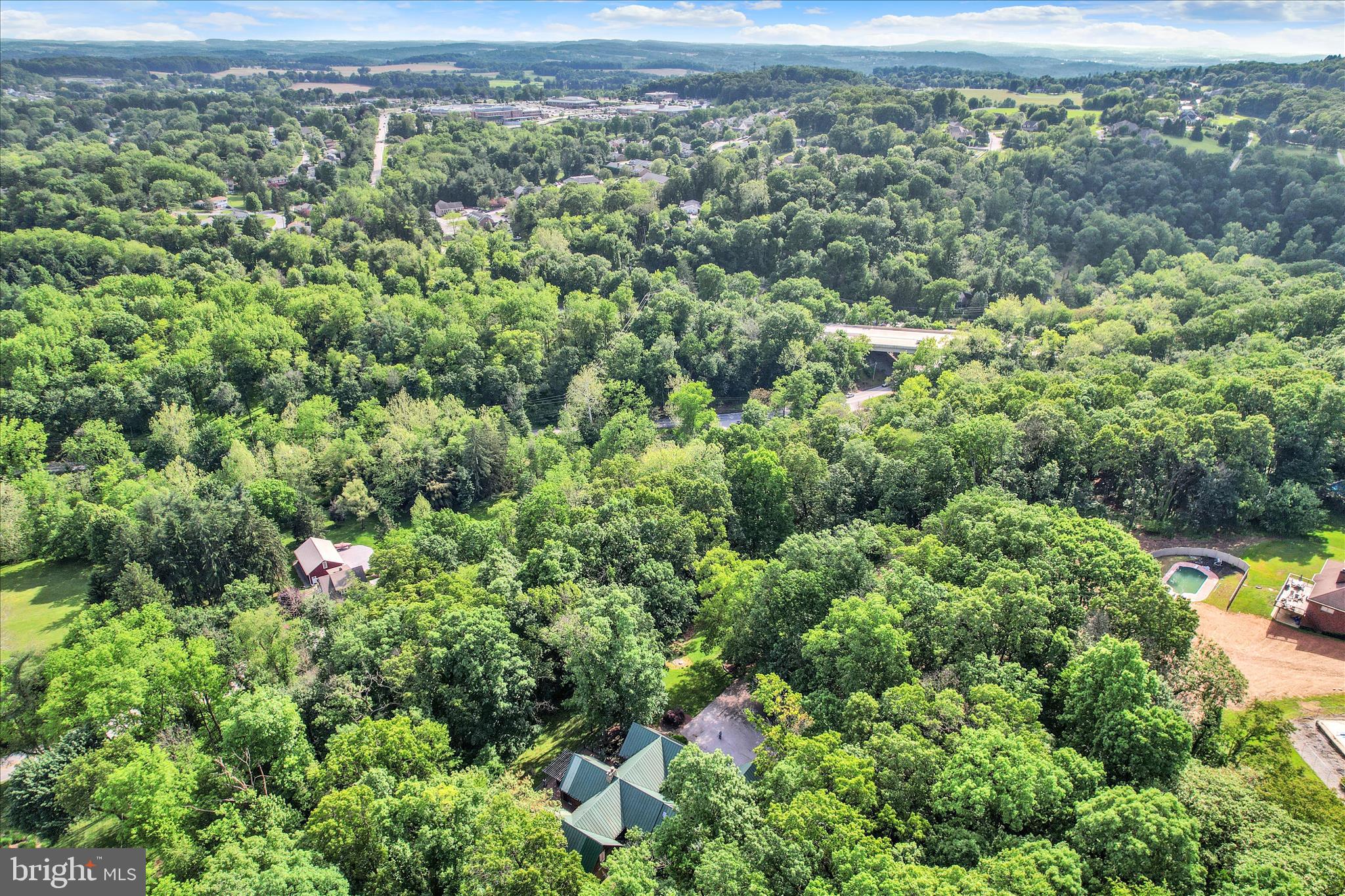 1855 Westwood Road York, PA 17403 - Photo 54 of 60 a view of a city with lush green forest